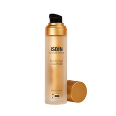 ISDIN Melaclear Advanced serum bottle on a vanity suggesting even skin tone