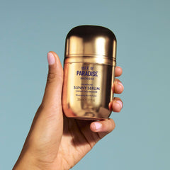 Isle of Paradise Sunny Serum Champagne packaging and pump for travel-friendly use.