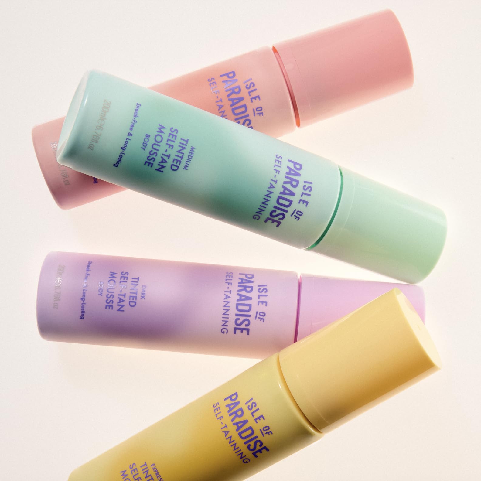Isle of Paradise tinted self tanning mousse plant-based oils hydrate skin.