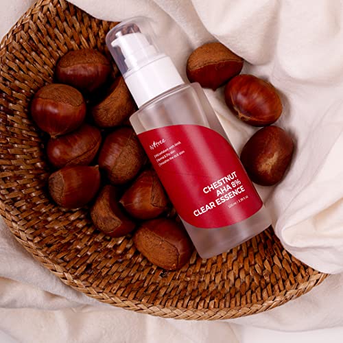 ISNTREE Chestnut AHA 8% Clear Essence on a bathroom shelf.