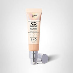 Model wearing IT Cosmetics Nude Glow for a dewy finish.