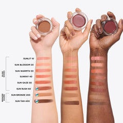 IT Cosmetics Do It All Serum Color Balm Sun Rush on bare skin for long-lasting hydration.
