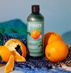 Highlight of natural-origin ingredients in ITÍNERA Itinera Daily Renewal Shampoo for vibrant hair.