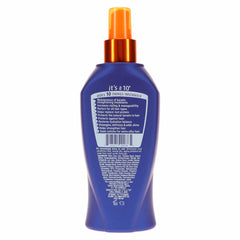 It's a 10 Haircare Miracle Leave-In Plus Keratin Spray mist on hair for smooth frizz-free styling