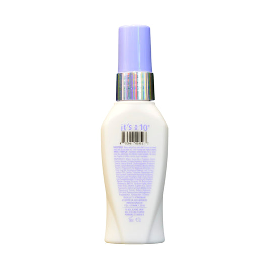 Close-up of It’s a 10 Scalp Restore Leave-In texture on fingers for scalp application.