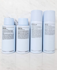 Vitamin E oil label shown on J Beverly Hills Blue Addbody Shampoo.