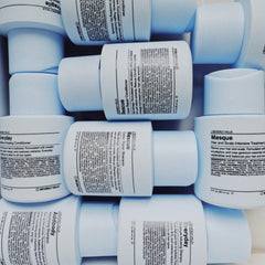 Side view of J Beverly Hills conditioner bottle emphasizing hydration for all hair types