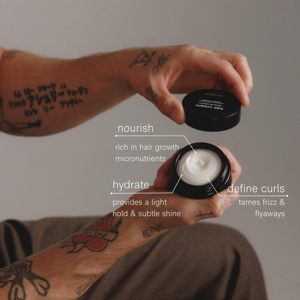 Jack Henry Hair Styling Cream tames flyaways for neat, controlled looks.