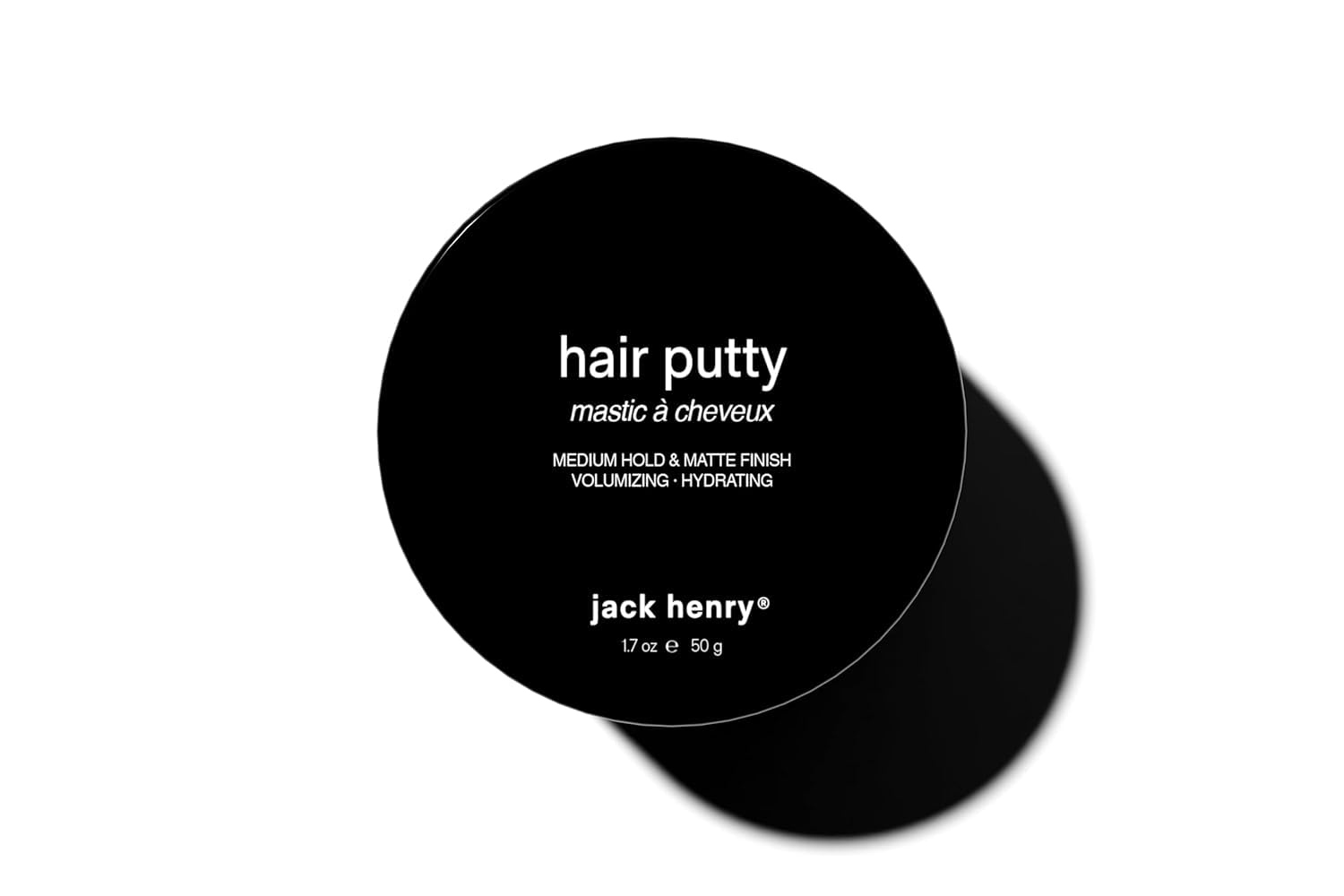 Jack Henry Hair Putty bottle closeup showing natural matte finish and medium hold.