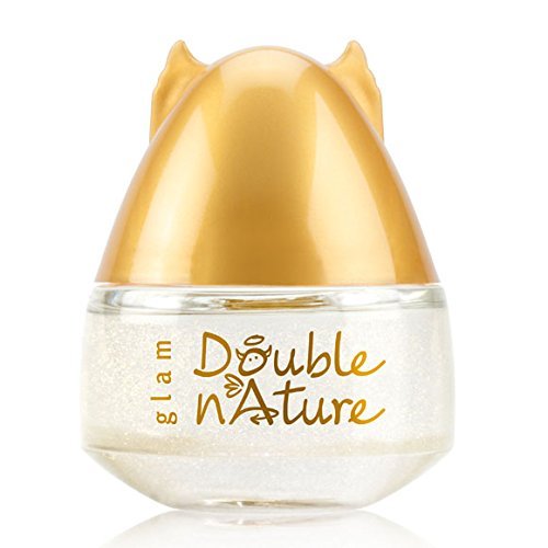 JAFRA Double Nature Glam bottle pour highlighting a sparkling, versatile scent for everyday wear.