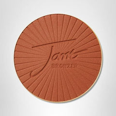 Jane Iredale PureBronze Matte Bronzer on cheeks and jaw for balanced warmth.