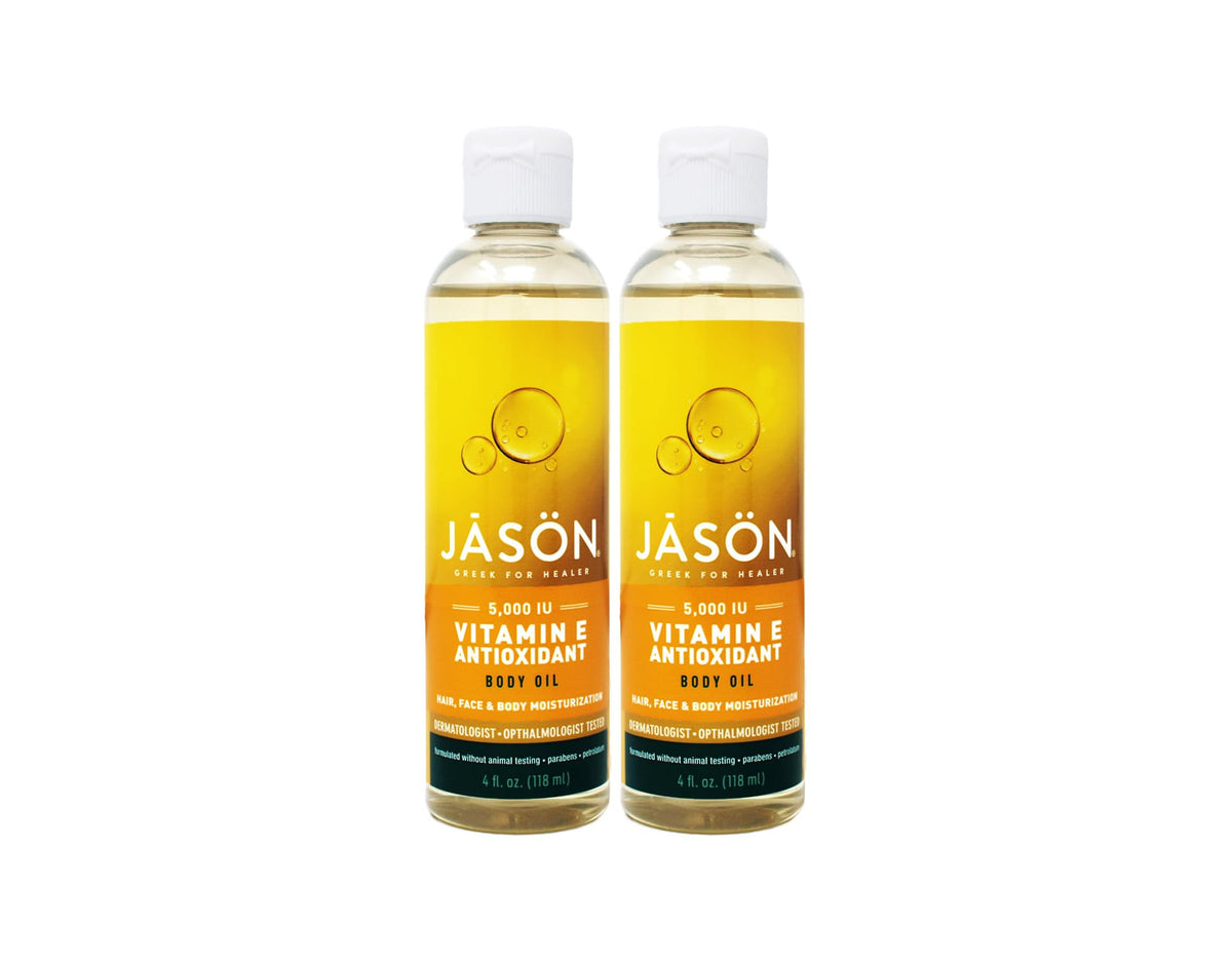 Jason Vitamin E Oil 5000 IU bottle with pour showing smooth application and hydration