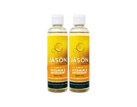 Jason Vitamin E Oil 5000 IU bottle with pour showing smooth application and hydration