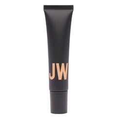 Lightweight cream texture of Jason Wu tinted moisturizer ready for blending.