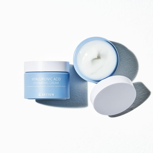 Close-up of JAYJUN Hyaluronic Cream showing 8-weight hyaluronic acids for hydration.