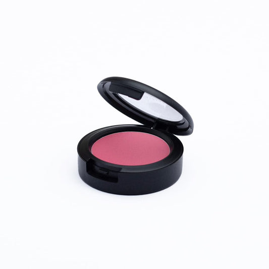 Jerome Alexander Blush ‘n’ Kiss Cream on cheeks with Watermelon tint for a natural glow.