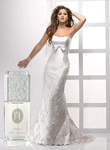 Jessica McClintock EDP bottle-closeup emphasizing floral bouquet