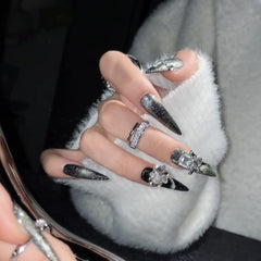 JIEADJIE press-on nails in black flash silver for instant salon-style hands.