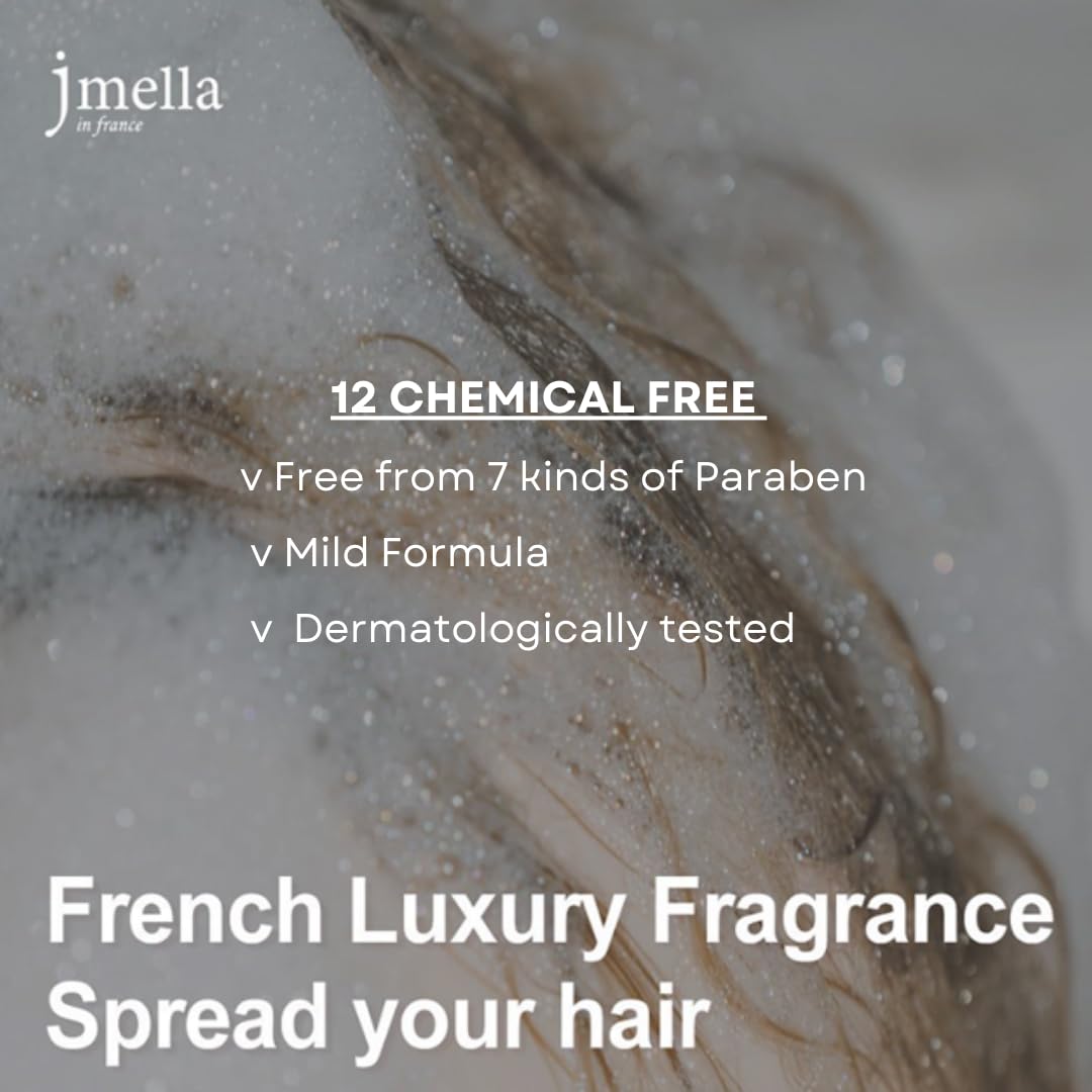 Creamy texture close-up of jmella Blooming Peony conditioner shows rich slip.