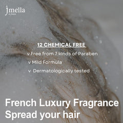 Creamy texture close-up of jmella Blooming Peony conditioner shows rich slip.