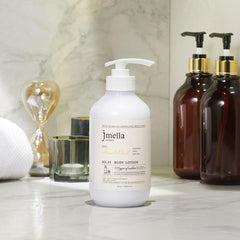 jmella Lime and Basil Body Lotion texture swatch reveals silky lotion consistency.