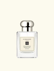 Jo Malone English Pear & Sweet Pea outer packaging in pastel tones evoking spring fragrance.