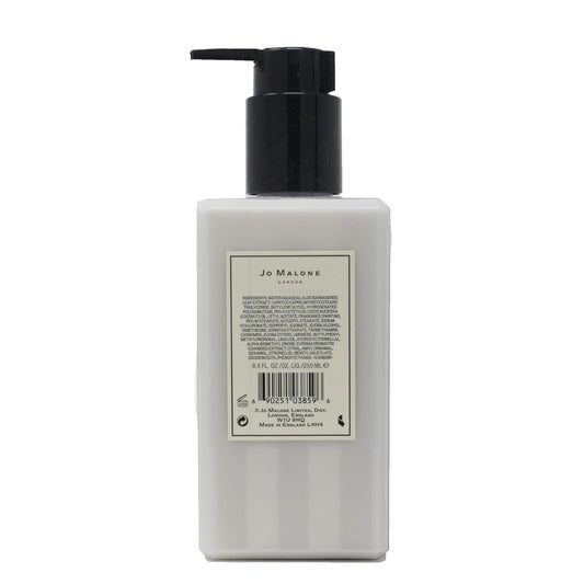 Jo Malone Lime Basil & Mandarin bottle pour, delivering silky hydration and gentle fragrance