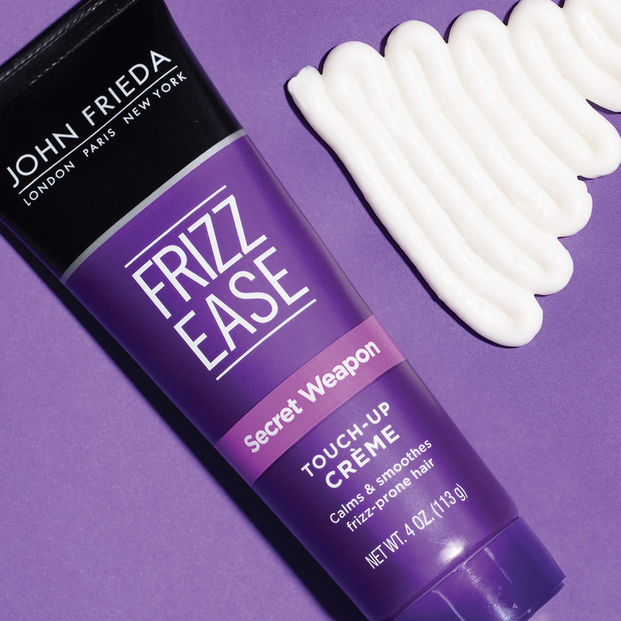 Midday touch-up moment with Frizz Ease Crème for smoother strands.
