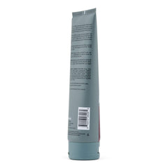 Johnny B All Over Shampoo bottle pour demonstrates deodorizing wash for hair and body.