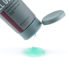Johnny B All Over Shampoo close-up highlights woodsy scent and luxurious lather.