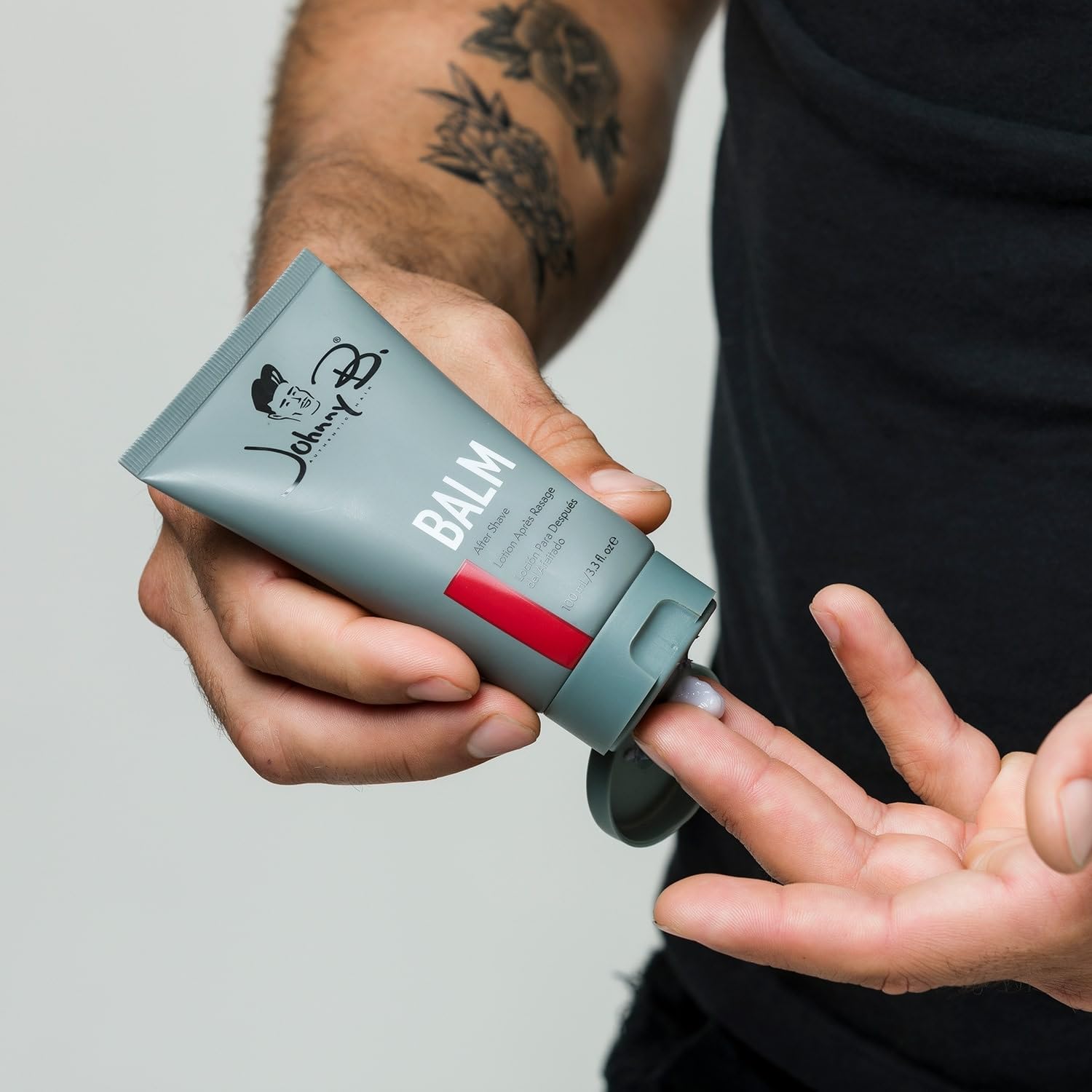 JOHNNY B. balm after shave packaging emphasizes USA-made quality.