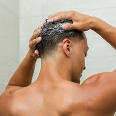 Johnny B. Professional Grow Hair Shampoo removes buildup for stronger, cleaner hair.