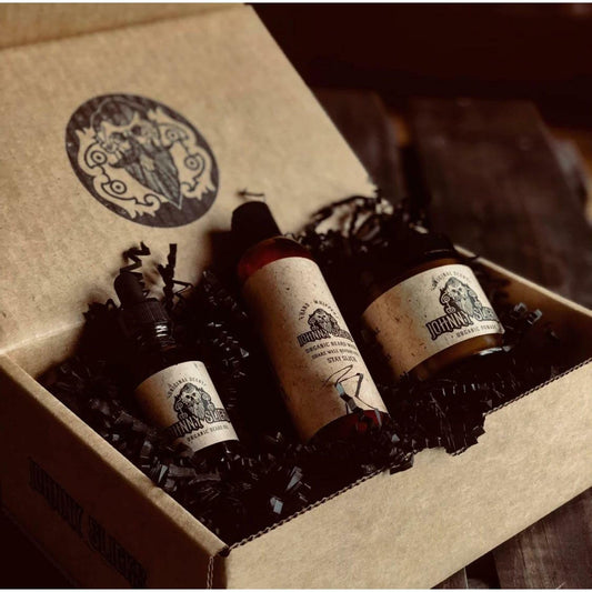 Johnny Slicks thinning hair kit beard oil bottle being applied to thinning areas for nourishment