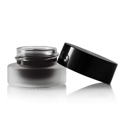 Jolie Onyx Black creme gel eyeliner pot in use for a clean, long-lasting line