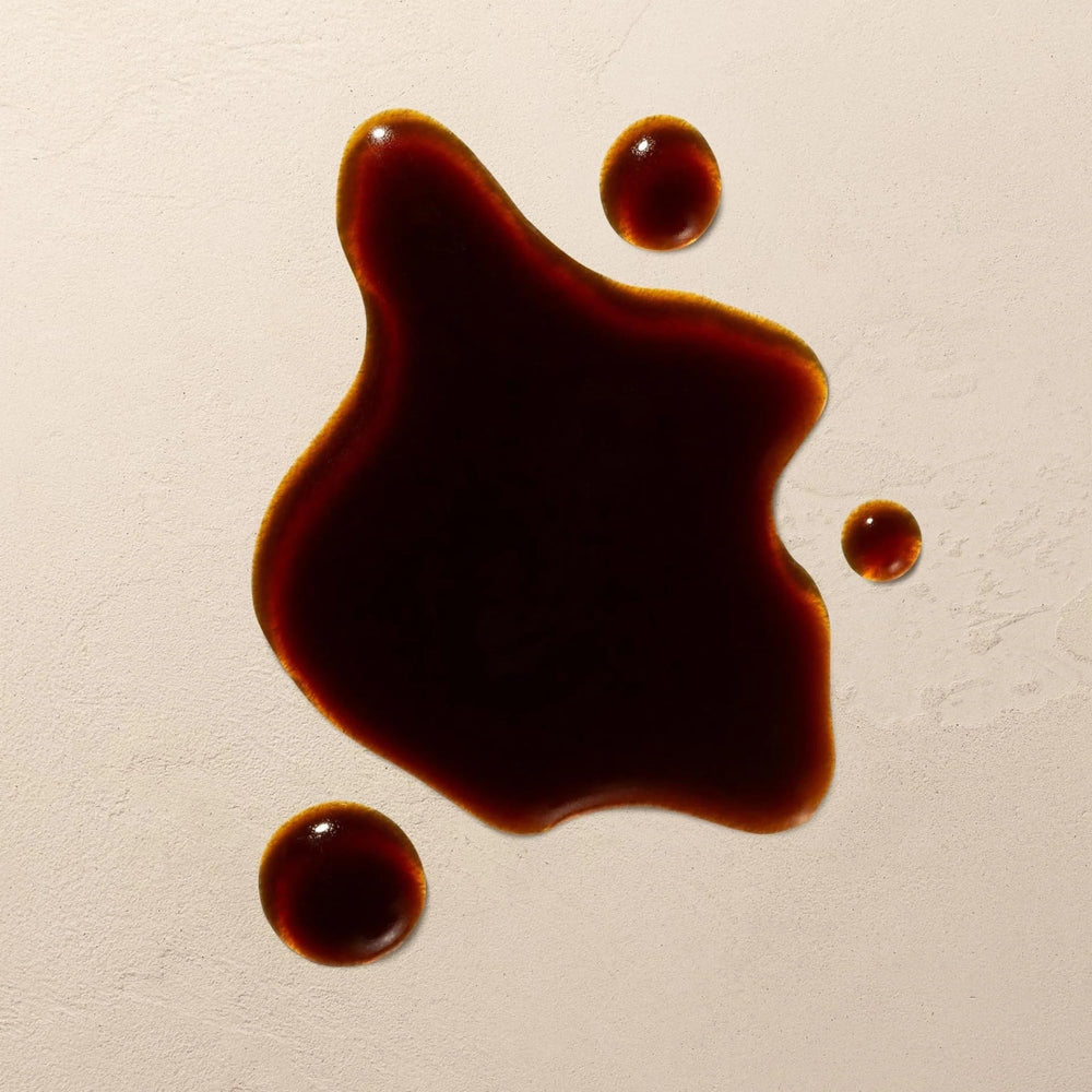 Josie Maran Argan Oil bottle showing hydrating tan development.