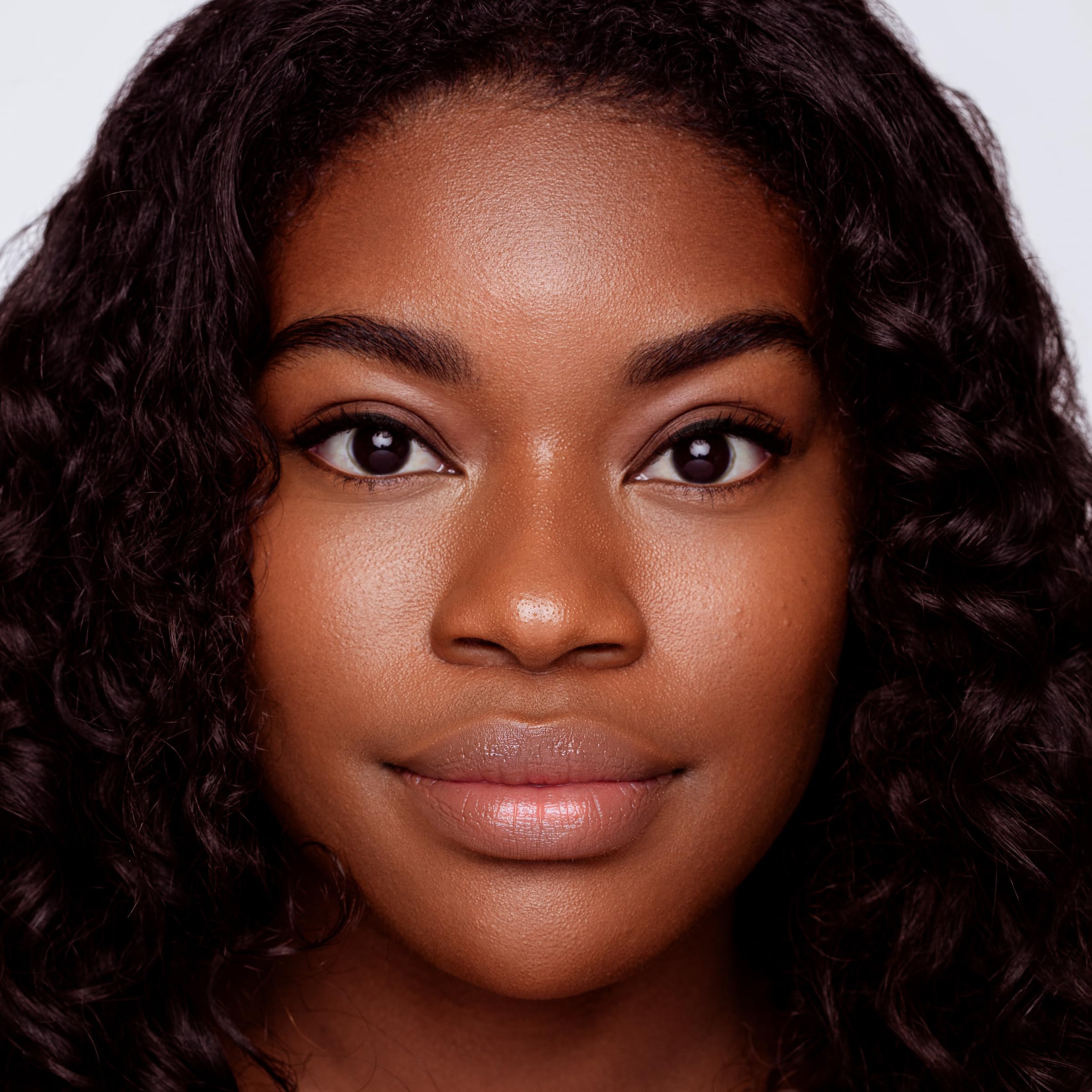 Jouer concealer creamy texture swirl for smooth, even blending.