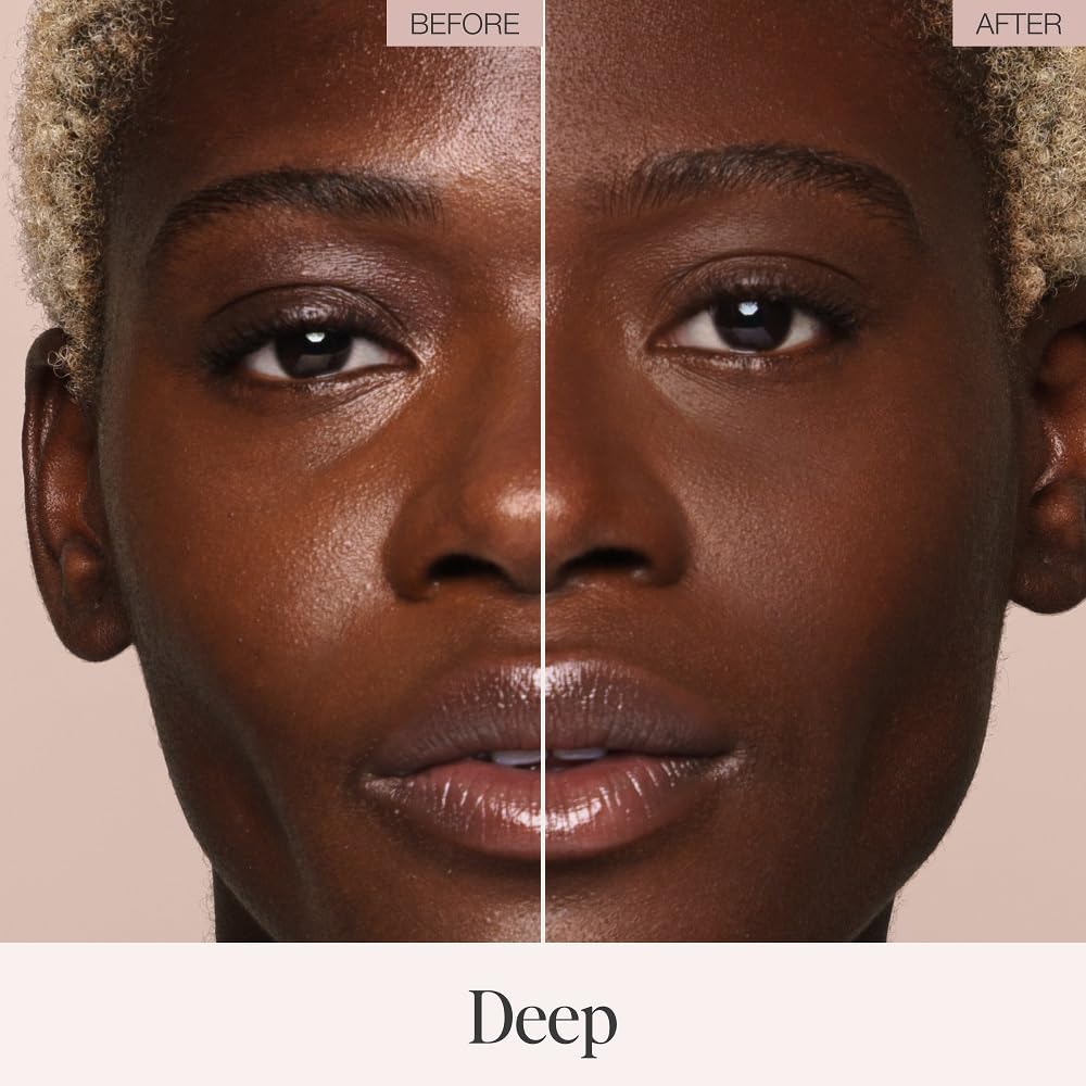 Jouer Deep shade compact sets foundation on deep skin with a neutral undertone.