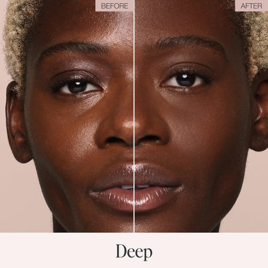 Jouer Deep shade compact sets foundation on deep skin with a neutral undertone.