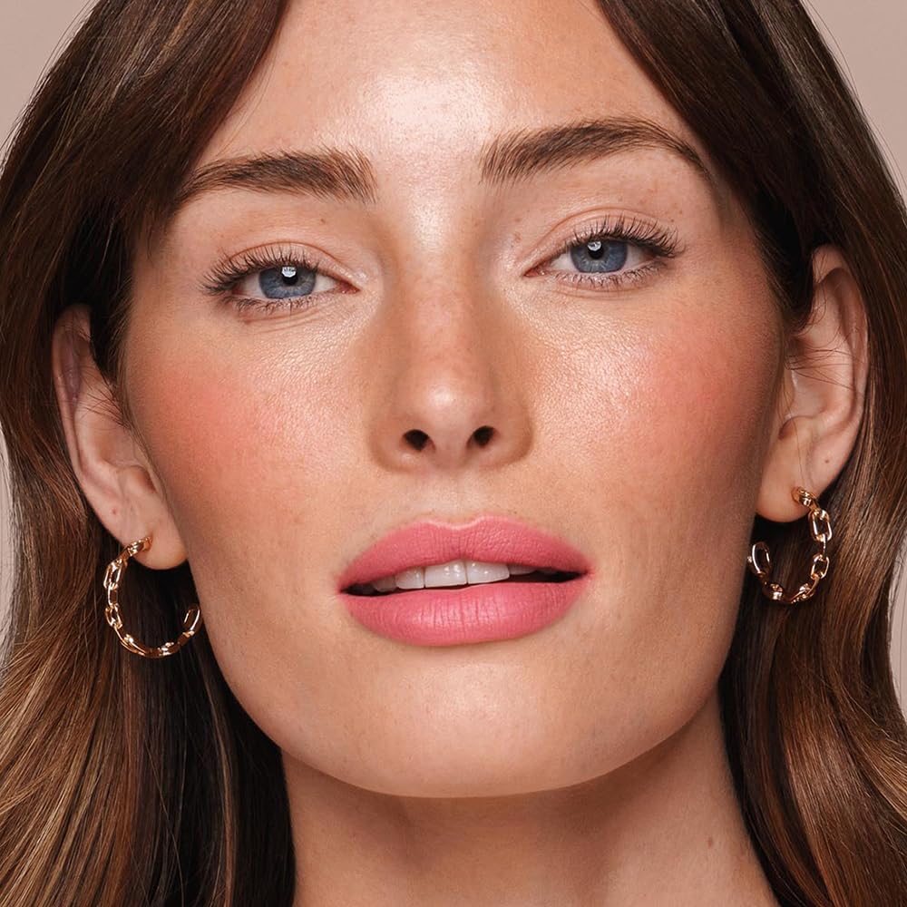 Jouer Demi-Matte Lip Balm texture closeup shows creamy feel and matte finish.
