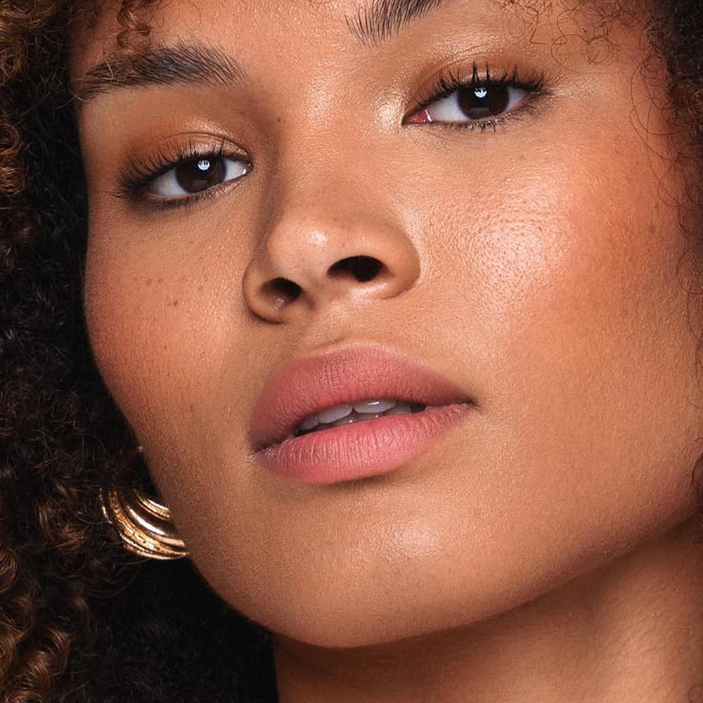 Jouer Demi-Matte Lip Balm with berry tones ideal for everyday color.