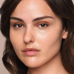 Jouer Essential Concealer Pen brightens skin tone for a lifted look.