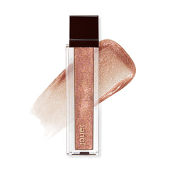 Jouer Long Wear Lip Topper application showing smooth glide and subtle shimmer for lips.