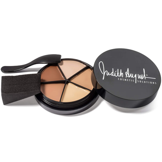 Judith August Killer Cover concealer swatch shows tattoo and bruise coverage.