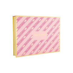 Juicy Couture mini lotion bottles showcasing 12 unique scents, perfect for travel.