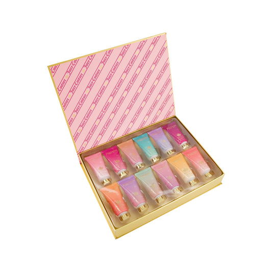 Juicy Couture 12-pack hand lotion set in chic gift box, ideal for on-the-go hydration.