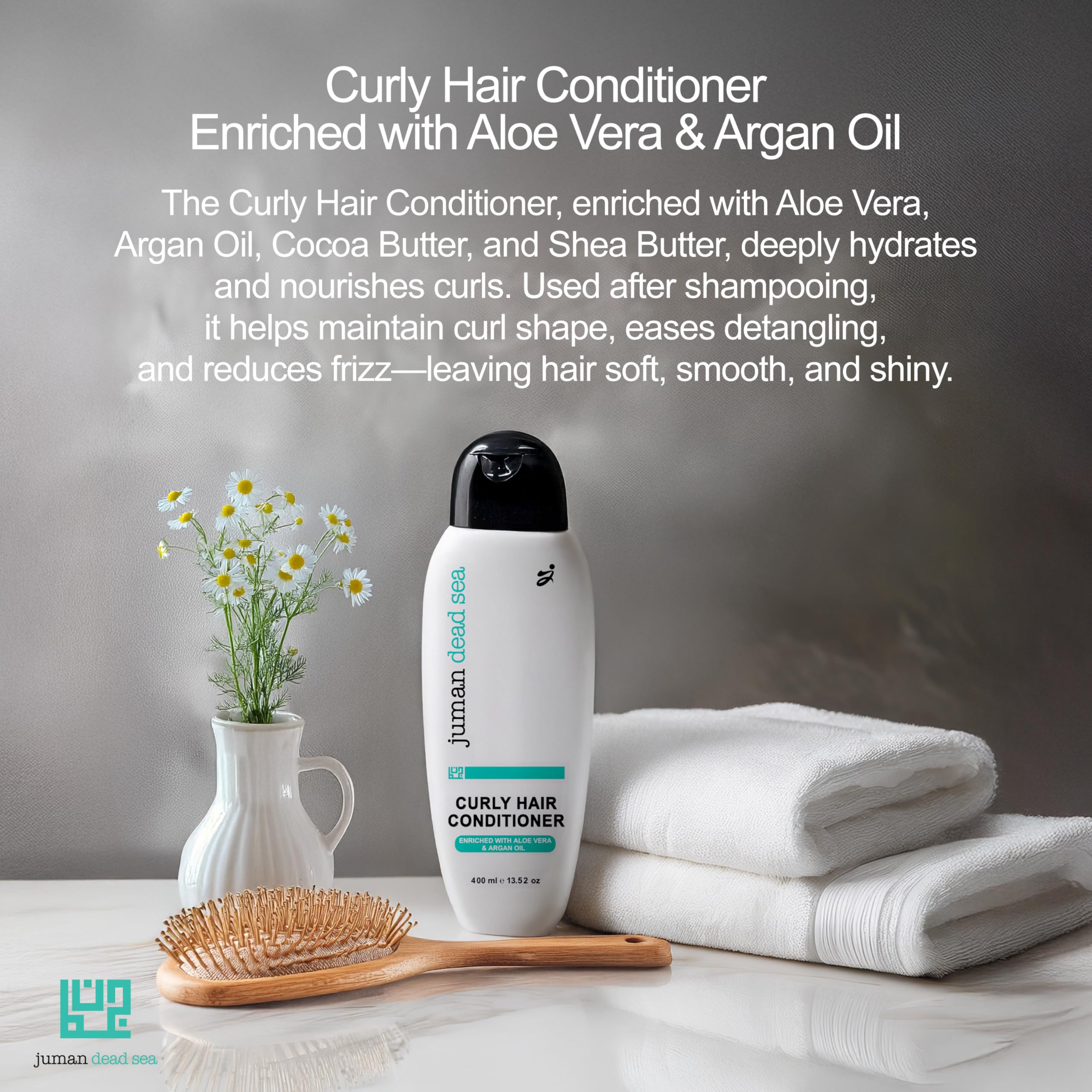 JUMAN Dead Sea Leave-In Conditioner hair curls close-up for defined waves.