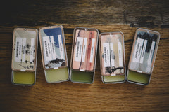 Juniper Ridge 0.5 oz tin packaging, compact travel essential.