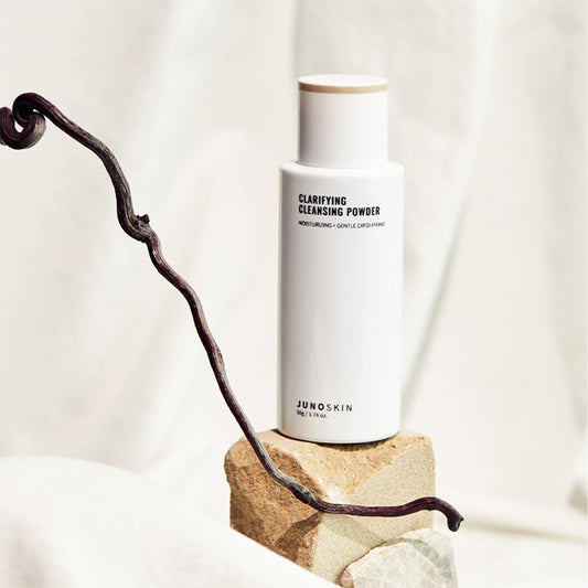 JUNO & Co cleansing powder being dispensed to form a gentle foam for quick cleansing.