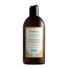 Just Nutritive Blonde Conditioner bottle showing brassy-tone neutralization for vibrant blondes.