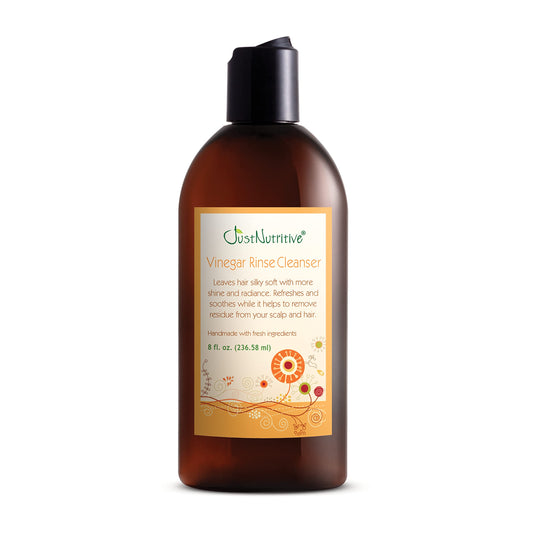 Just Nutritive Vinegar Rinse Cleanser bottle with herbal ingredients for scalp refreshment.